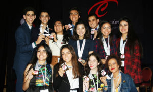 Creer Para Ver, the winning LDZ team at Celebracion 2018, poses with their first place medals.