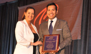 Carlos Paz, Jr. with NHI Board Chair Michelle Saenz Rodriguez at the 2015 NHI Alumni Award Ceremony