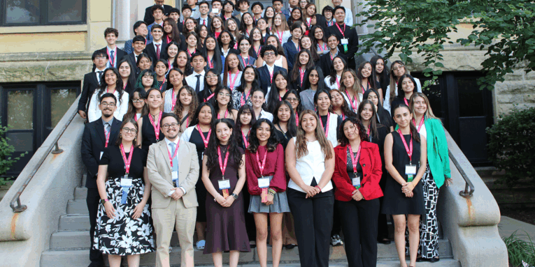 NHI students standing on stairs for group photo at 2025 Midwest Great Debate at Augustana College
