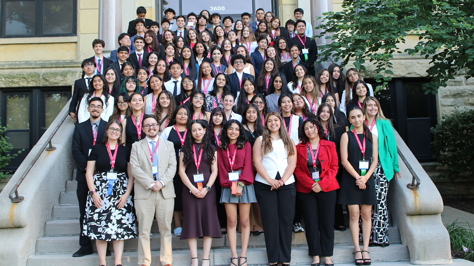 NHI students standing on stairs for group photo at 2025 Midwest Great Debate at Augustana College