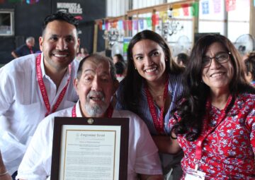 Carlos Paz, Ernesto Nieto, Rep. Alexandria Ocasio-Cortez, and Gloria de Leon with Congressional Record proclamation for Nieto