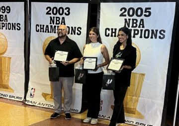 nicole nieto getting award from san antonio spurs