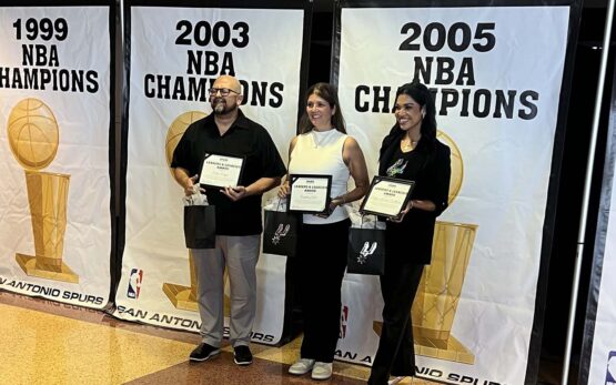 nicole nieto getting award from san antonio spurs