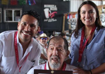 Former NHI Persons of the year Carlos Paz and Alexandria Ocasio-Cortez with Ernesto Nieto
