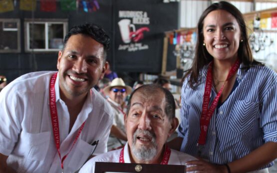 Former NHI Persons of the year Carlos Paz and Alexandria Ocasio-Cortez with Ernesto Nieto