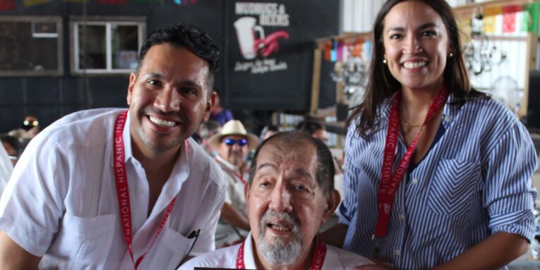 Former NHI Persons of the year Carlos Paz and Alexandria Ocasio-Cortez with Ernesto Nieto
