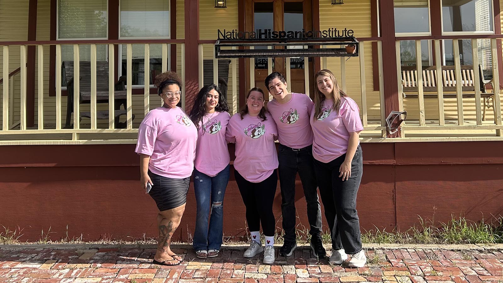 2026 nhi summer interns in front of annex in buc-ee's shirts